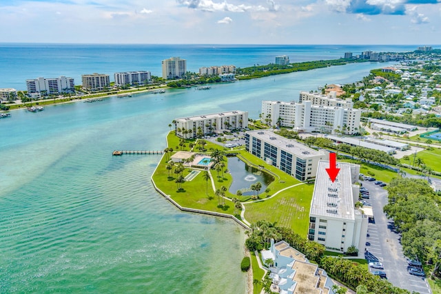 drone / aerial view with a water view