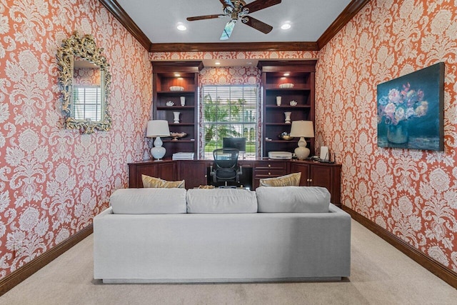 living room featuring ornamental molding, carpet floors, and ceiling fan