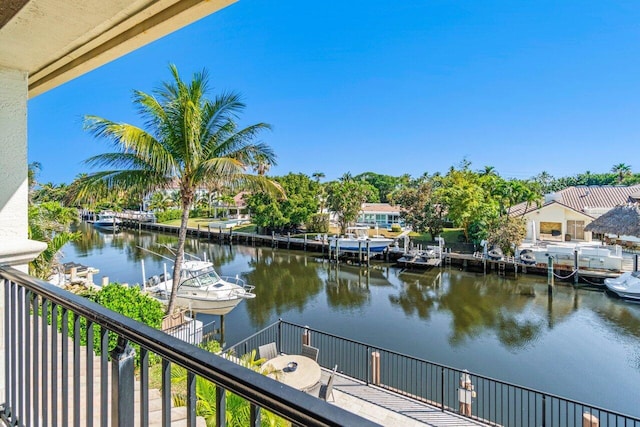 property view of water featuring a boat dock