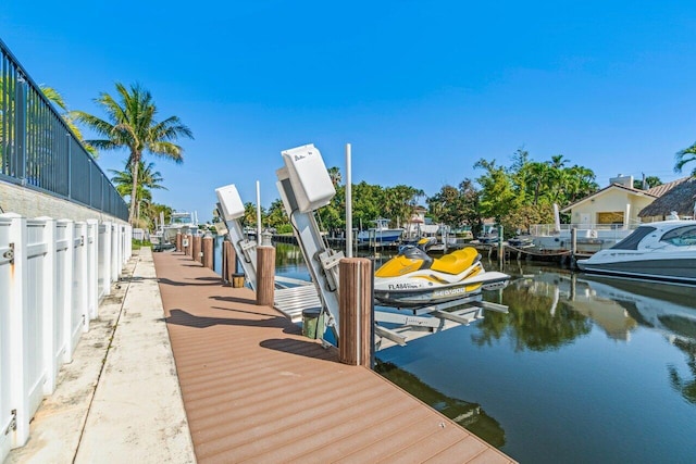 dock area featuring a water view