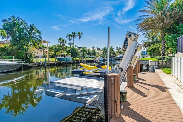 view of dock with a water view