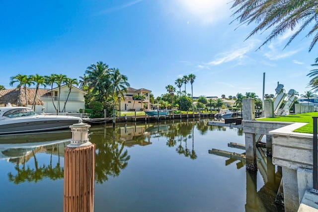 property view of water featuring a boat dock