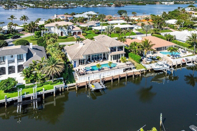 bird's eye view with a water view