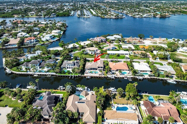 drone / aerial view with a water view