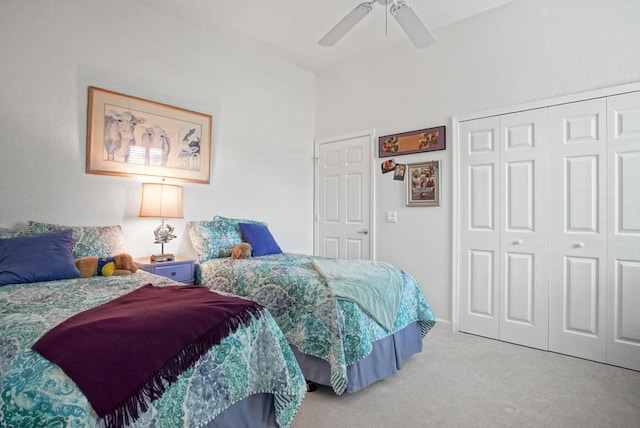 bedroom featuring a closet, ceiling fan, and carpet