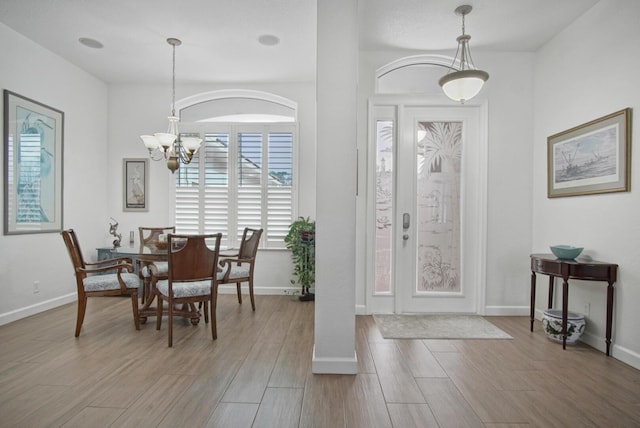 foyer featuring a notable chandelier