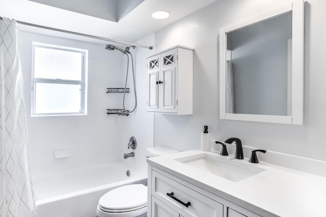 full bathroom with vanity, shower / bathtub combination with curtain, and toilet