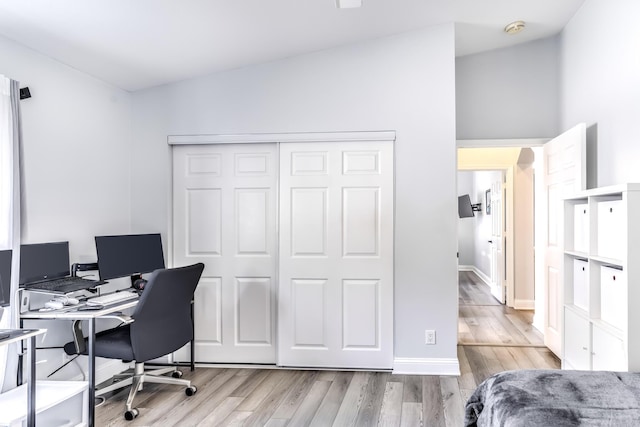 office with light hardwood / wood-style floors