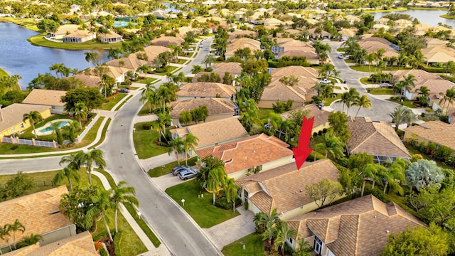 bird's eye view with a water view