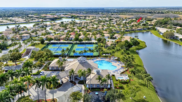 birds eye view of property featuring a water view