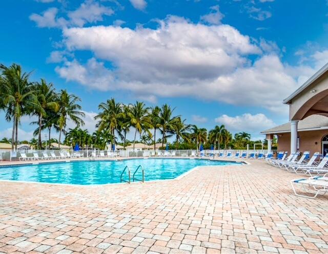 view of swimming pool featuring a patio area