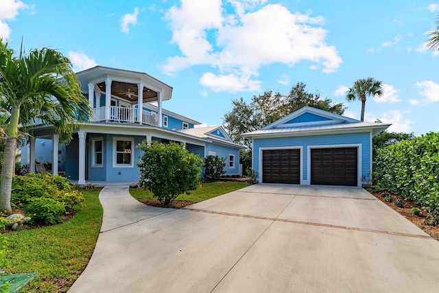 view of front of house with a balcony and a garage