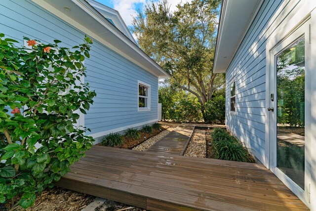 view of home's exterior featuring a deck