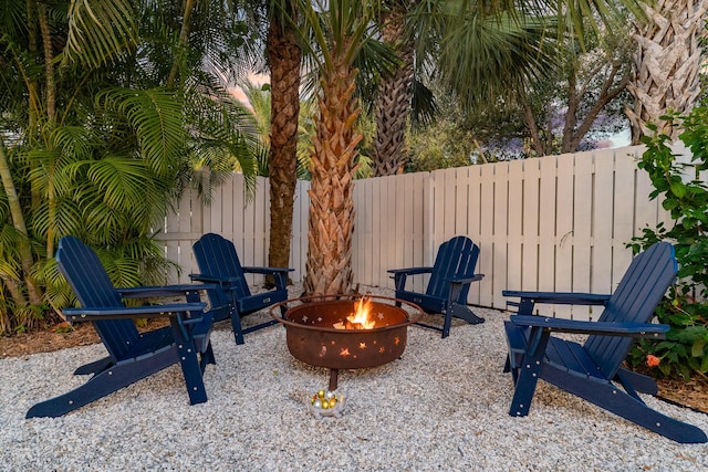 view of patio / terrace featuring an outdoor fire pit