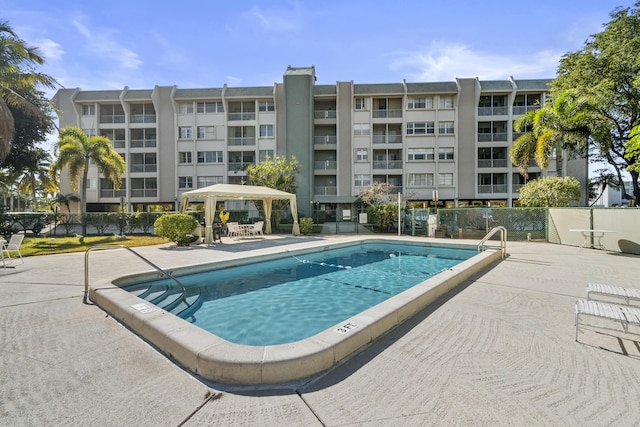 view of pool with a gazebo and a patio area