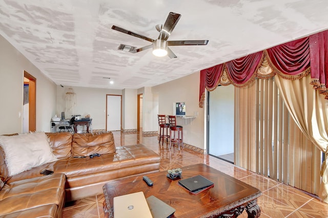 living room featuring ceiling fan