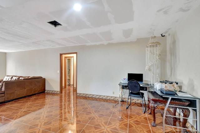 home office with a chandelier