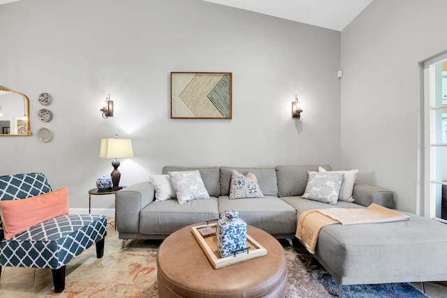 living room with lofted ceiling