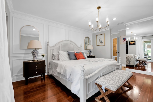 bedroom with ornamental molding, dark hardwood / wood-style flooring, and a notable chandelier