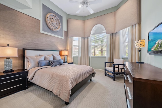 bedroom featuring light carpet