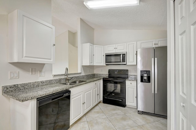 kitchen with sink, white cabinets, and black appliances