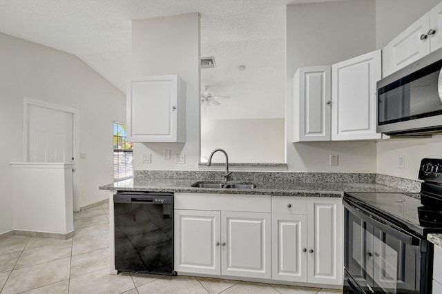 kitchen with sink, ceiling fan, white cabinetry, black appliances, and stone countertops