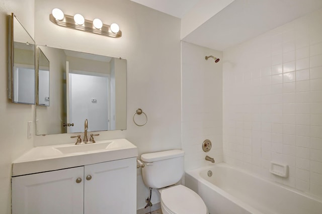 full bathroom featuring vanity, toilet, and tiled shower / bath