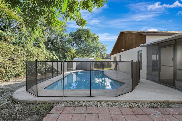 view of pool featuring a patio area