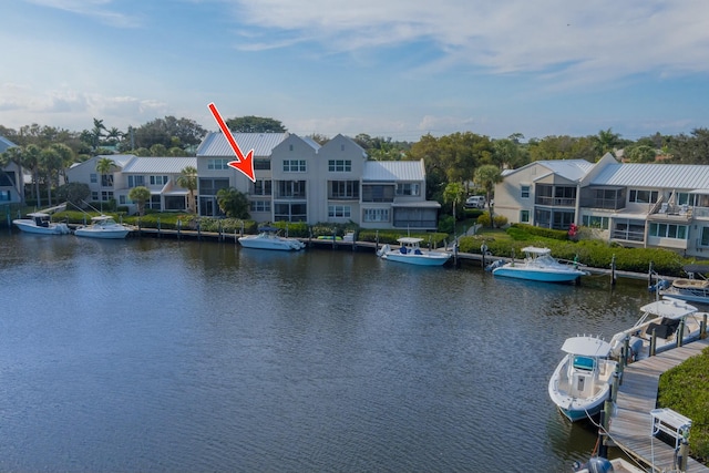 property view of water with a dock