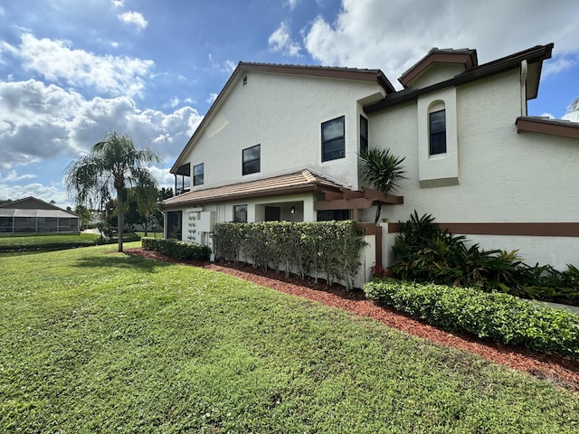 exterior space featuring a lawn