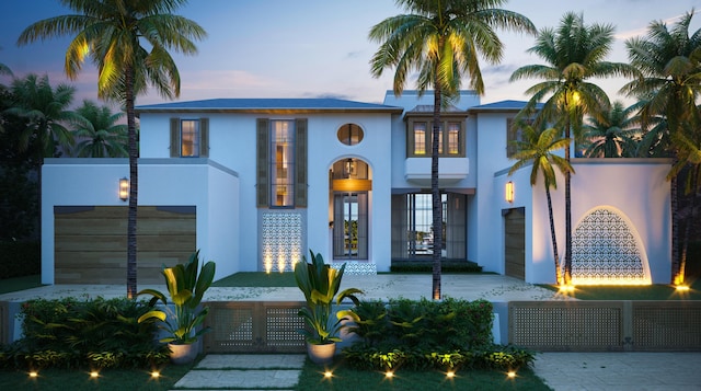 mediterranean / spanish-style house featuring stucco siding