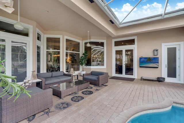 view of patio / terrace with french doors and an outdoor hangout area