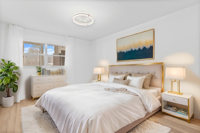 bedroom featuring light hardwood / wood-style floors