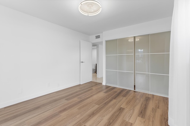 empty room featuring light hardwood / wood-style floors