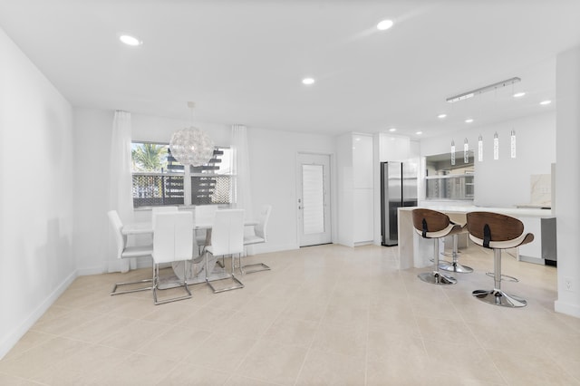 dining room featuring a chandelier