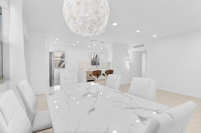 dining room featuring a chandelier