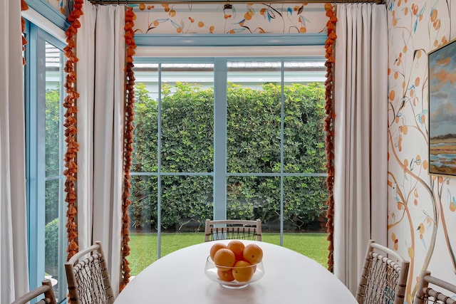 dining area featuring a healthy amount of sunlight