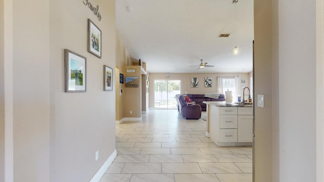 hallway with sink