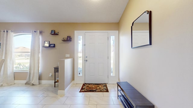 foyer with light tile patterned floors