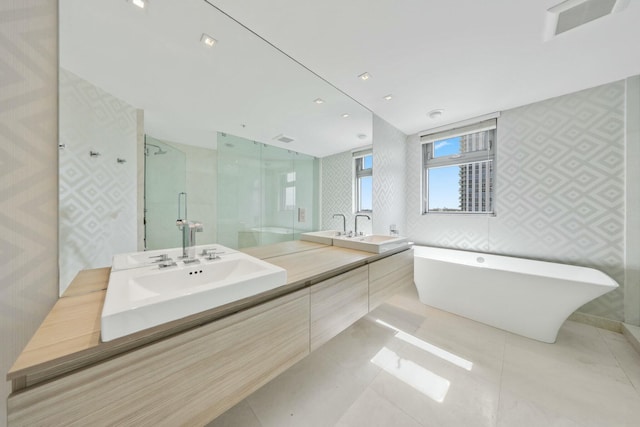 bathroom with vanity, tile patterned flooring, and independent shower and bath