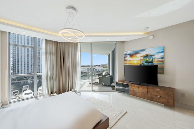 bedroom featuring floor to ceiling windows and access to outside