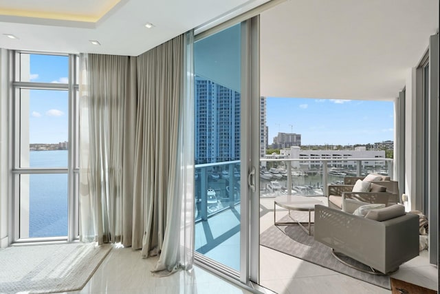balcony with a city view and a water view