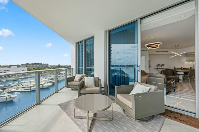 balcony featuring a water view