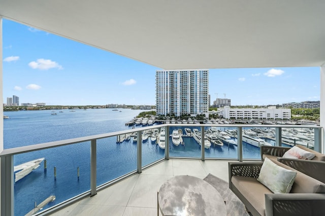 balcony with a city view and a water view