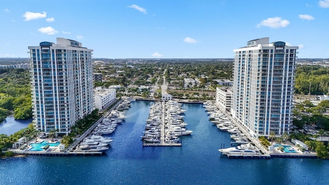 birds eye view of property with a water view