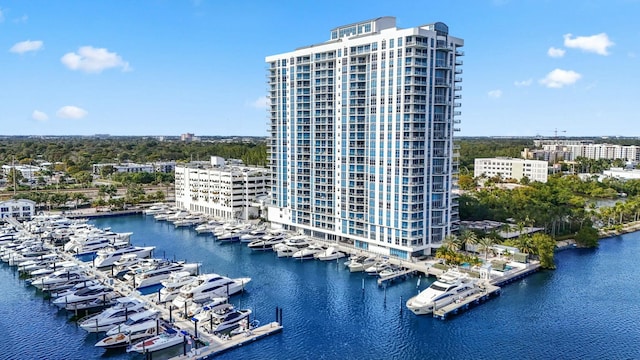aerial view featuring a city view and a water view
