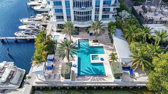 birds eye view of property with a water view