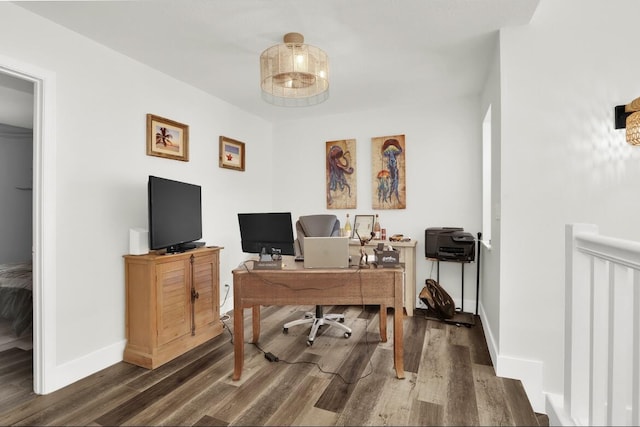 office space with dark hardwood / wood-style flooring