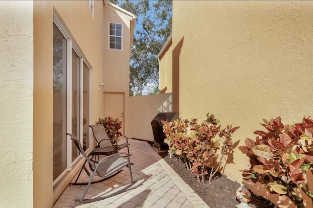 view of patio with a grill