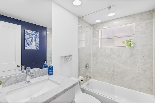 full bath featuring toilet, washtub / shower combination, and vanity